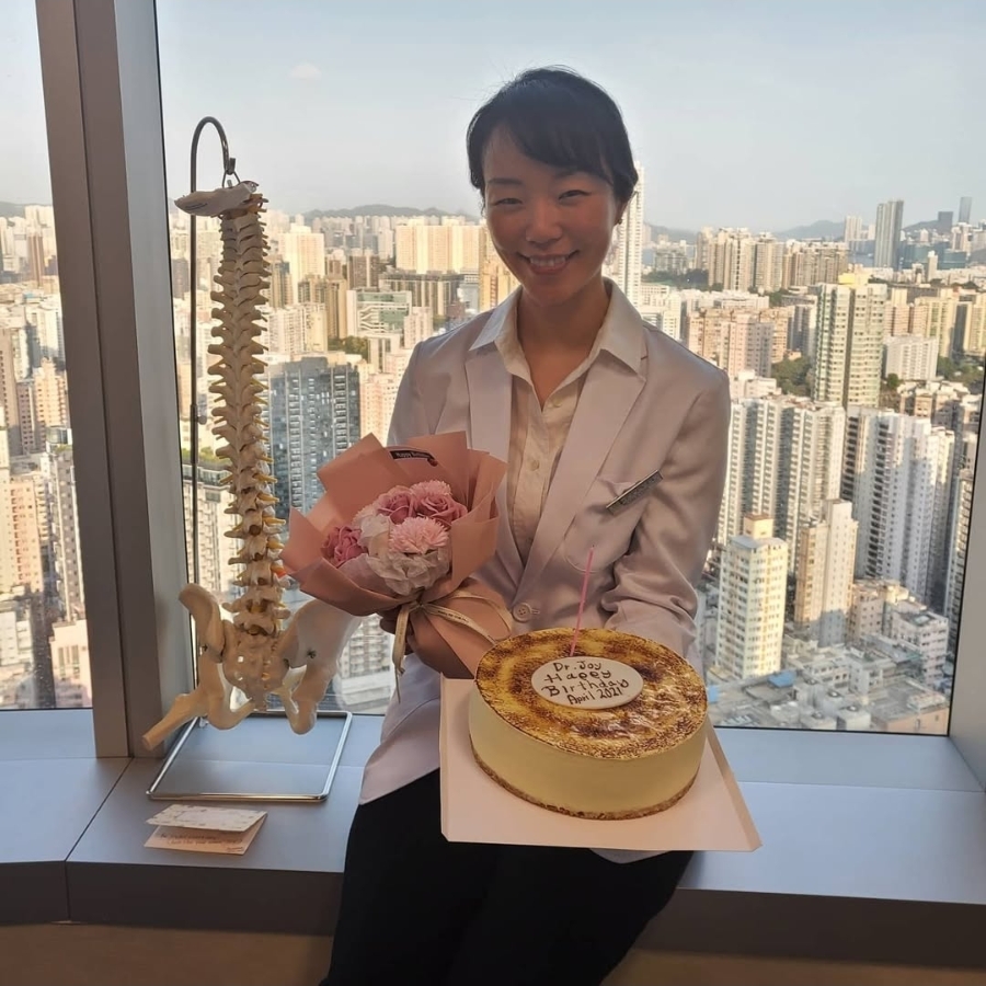 Dr. Joy (Ji Young Lim, D.C.) at her clinic in Hong Kong